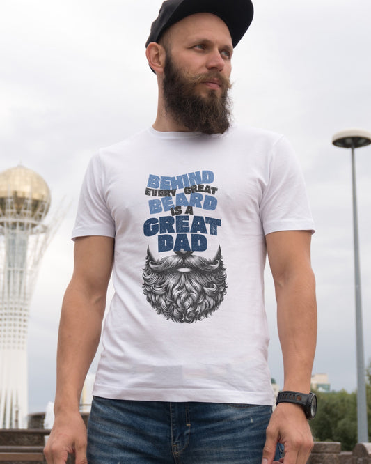 White graphic t-shirt with image of beard withe words "behind every great beard is a great dad" above the beard in blue font.